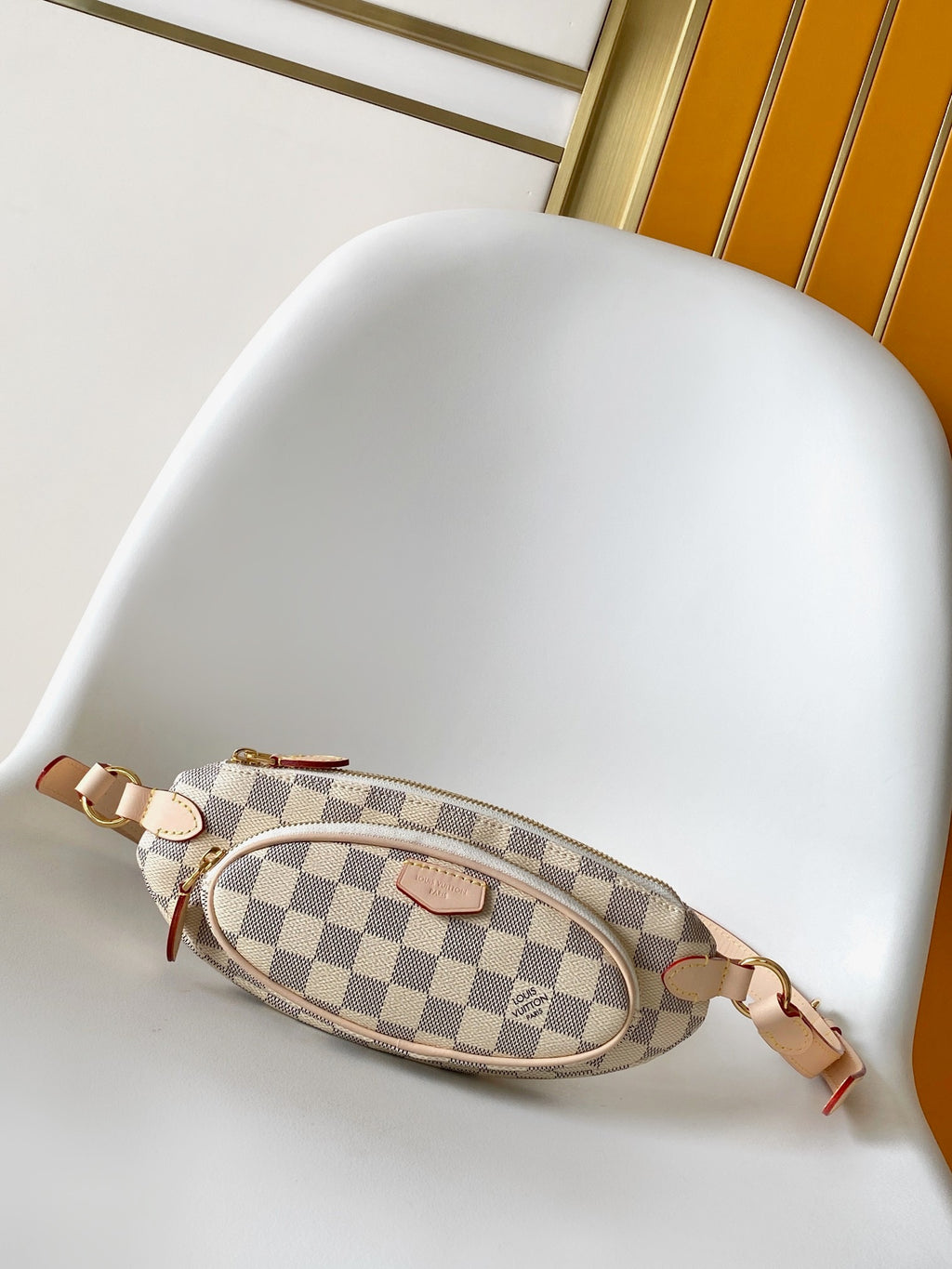 L V white checkered cross body