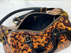 L V tortoise bag
