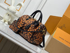 L V tortoise bag