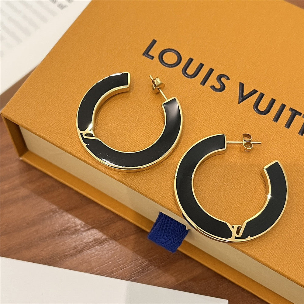 L V blk/gold earrings