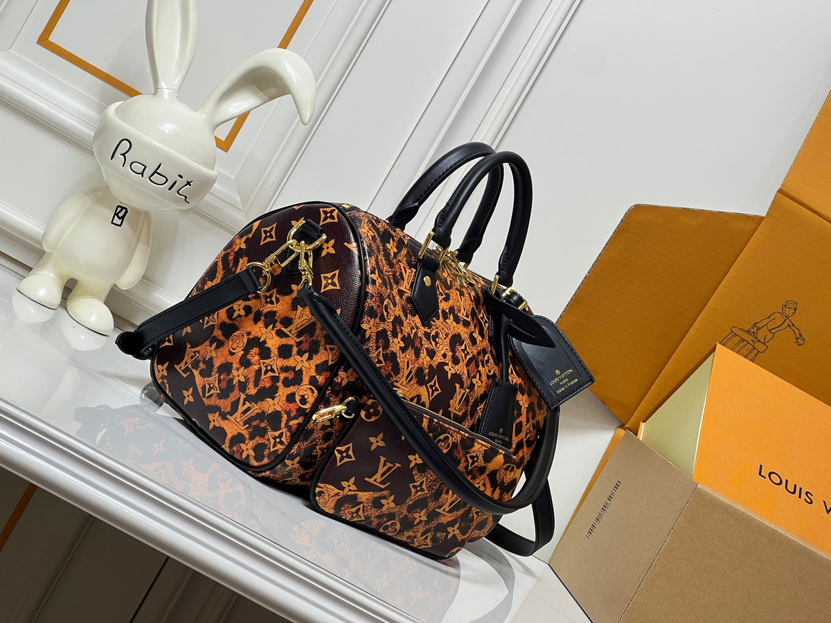 L V tortoise bag